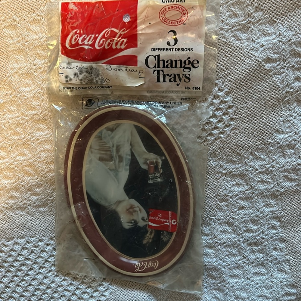 Collectible Coca-Cola change trays